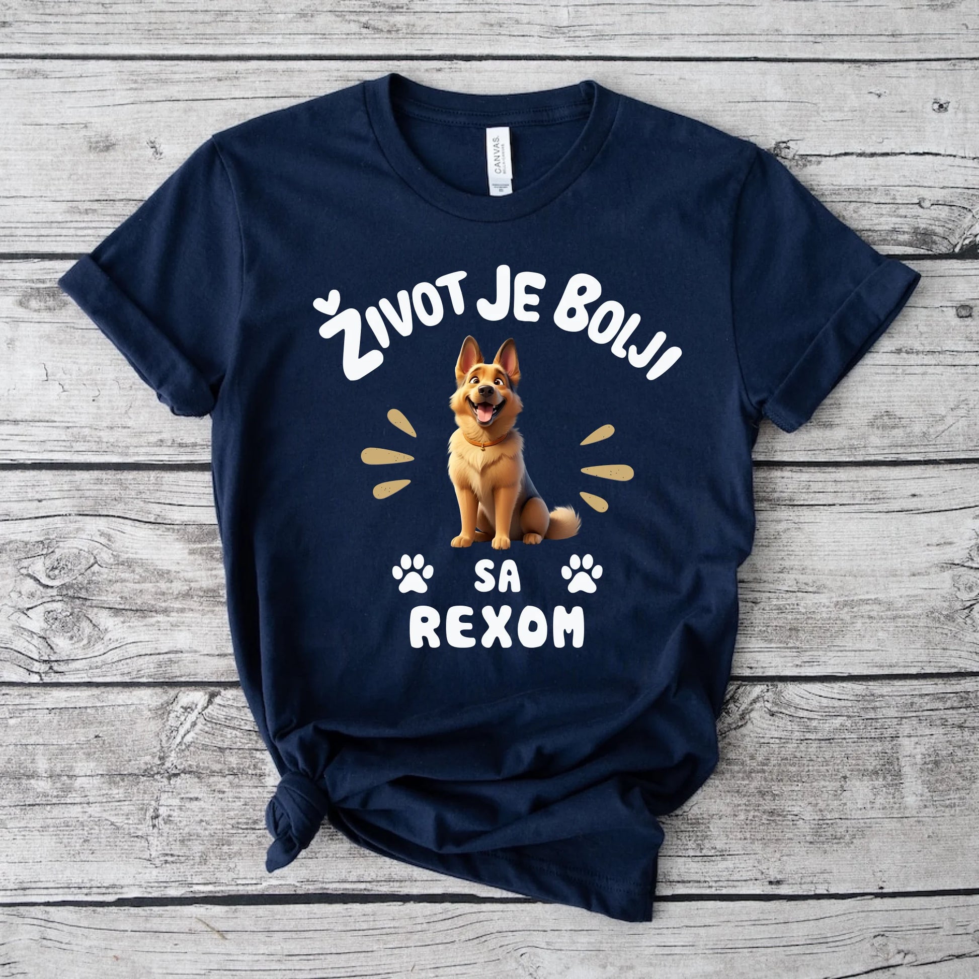 Navy blue t-shirt with a dog graphic and text on a wooden surface